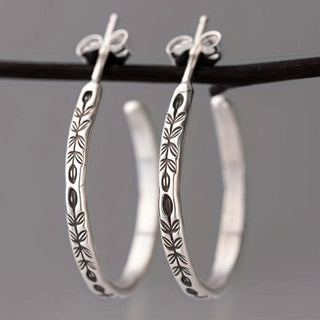 Elegante silberne Creolen