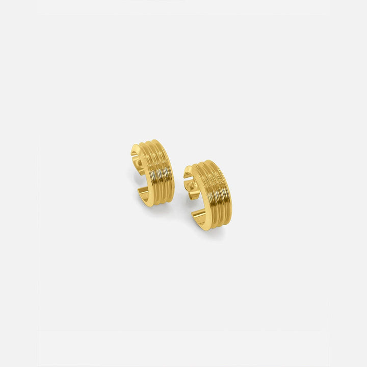 Faszinierende goldene Rippenohrringe