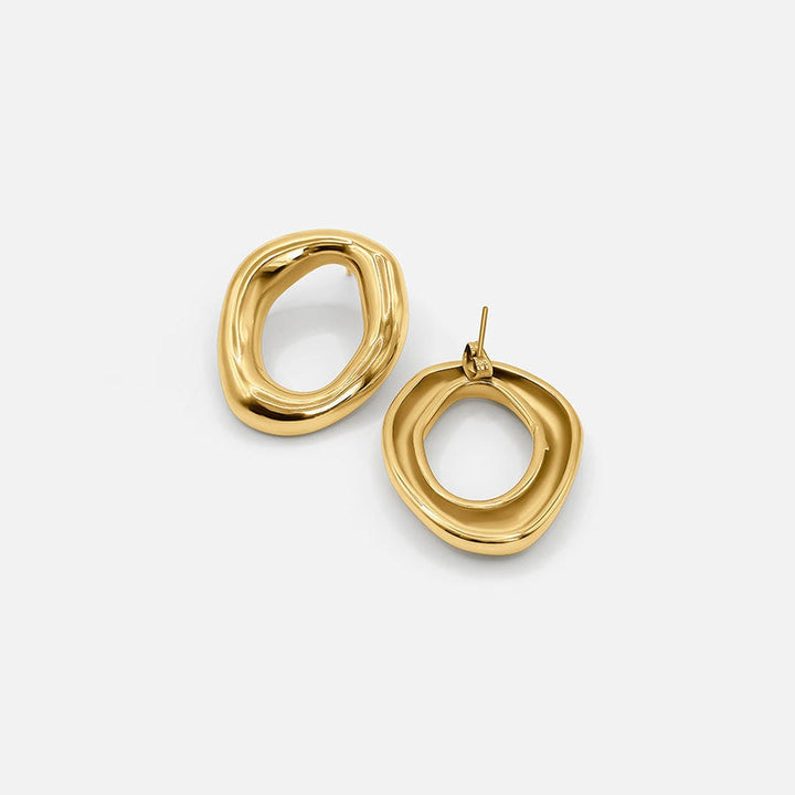 Elegante geschwungene offene ovale Ohrringe aus Gold