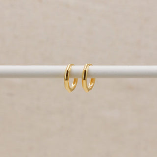 Goldene Fasen-Huggie-Ohrringe