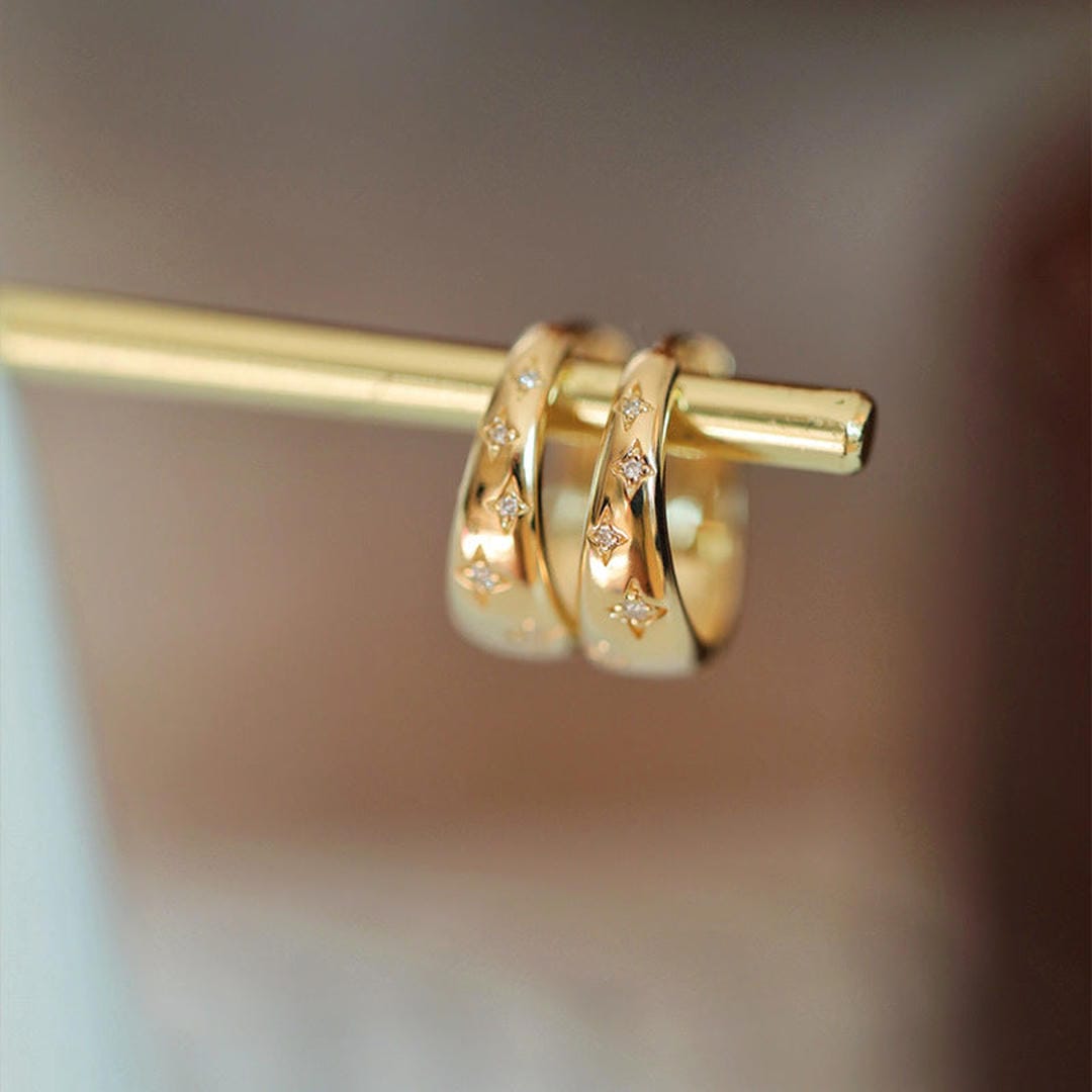 Luxuriöse Ohrringe aus Gold und Silber