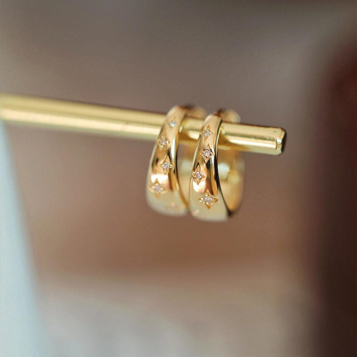 Luxuriöse Ohrringe aus Gold und Silber