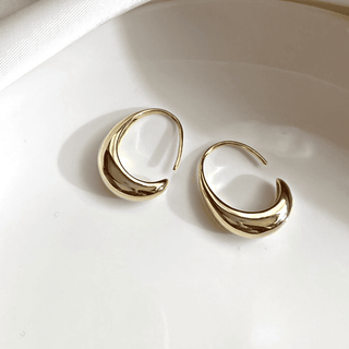 Ovale Creolen aus Gold und Silber