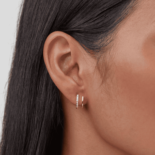 Krallen-Ohrringe aus Gold mit Kristall