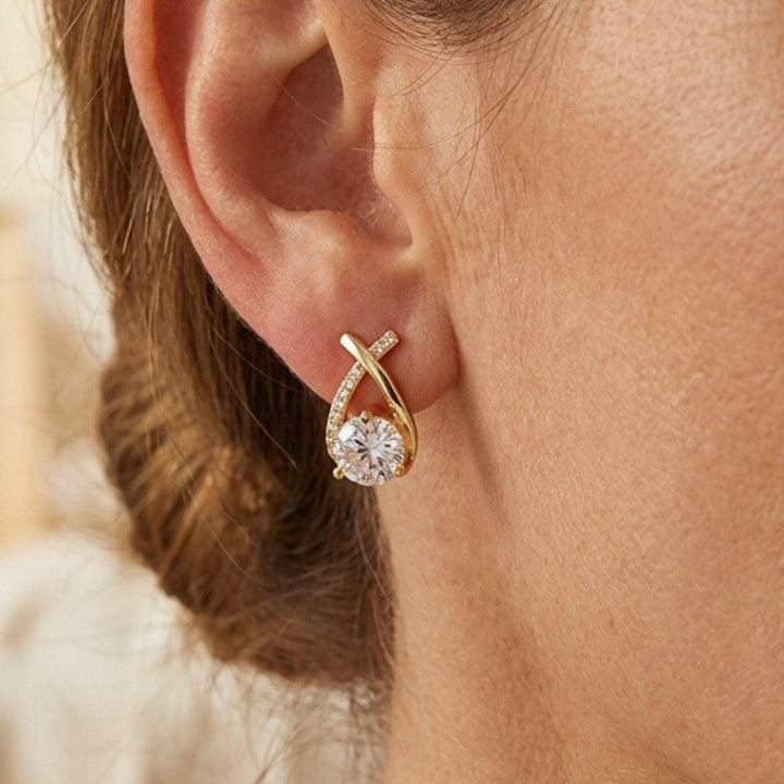 Luxuriöse gedrehte Tropfen-Cubic-Stud-Ohrringe