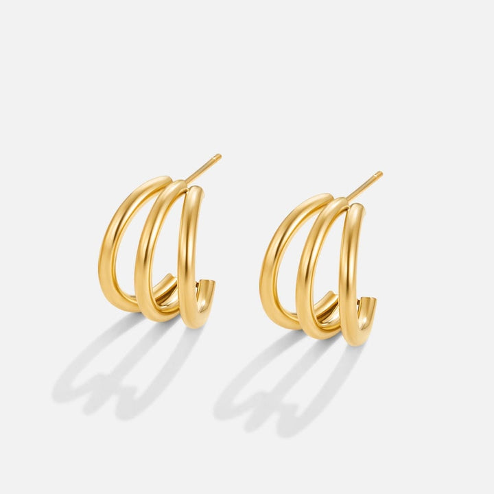 Dreifache Ohrringe aus Gold