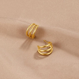Dreifache Ohrringe aus Gold