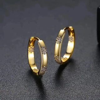 Vintage goldene Blumen-Ohrringe