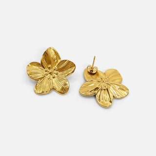 Elegante goldene Blumen-Ohrringe