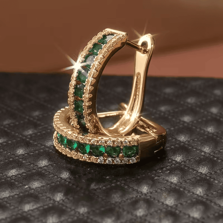 Elegante Ohrringe mit Smaragd-Glanz