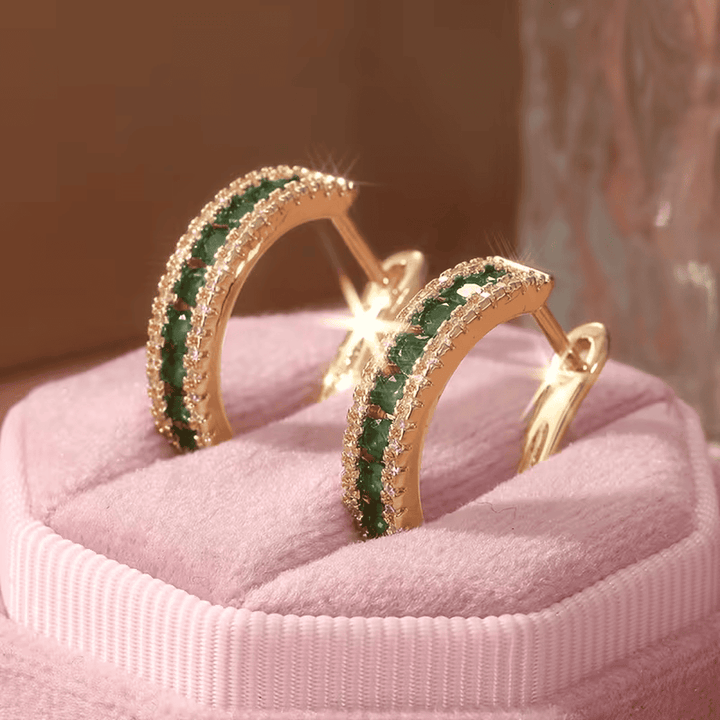 Elegante Ohrringe mit Smaragd-Glanz