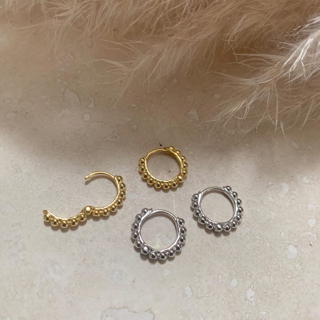Gelenkige Bubble-Ohrringe in Gold oder Silber