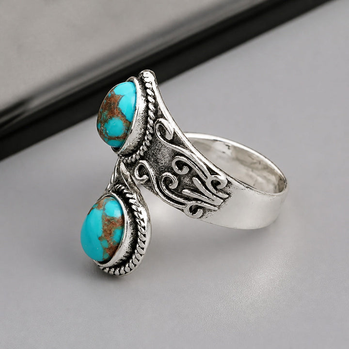 Ring Kreuz mit Türkis