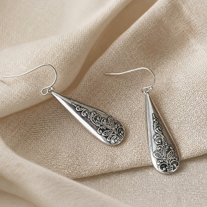 Vintage Ohrringe mit Blumenrelief